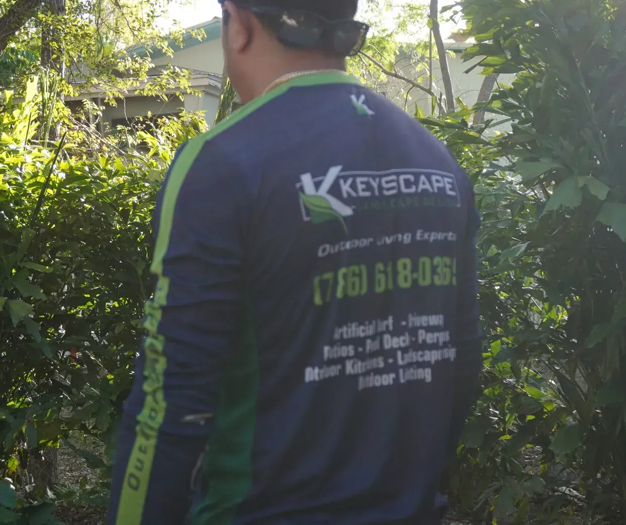 Keyscape team member working in a tropical Keys landscape